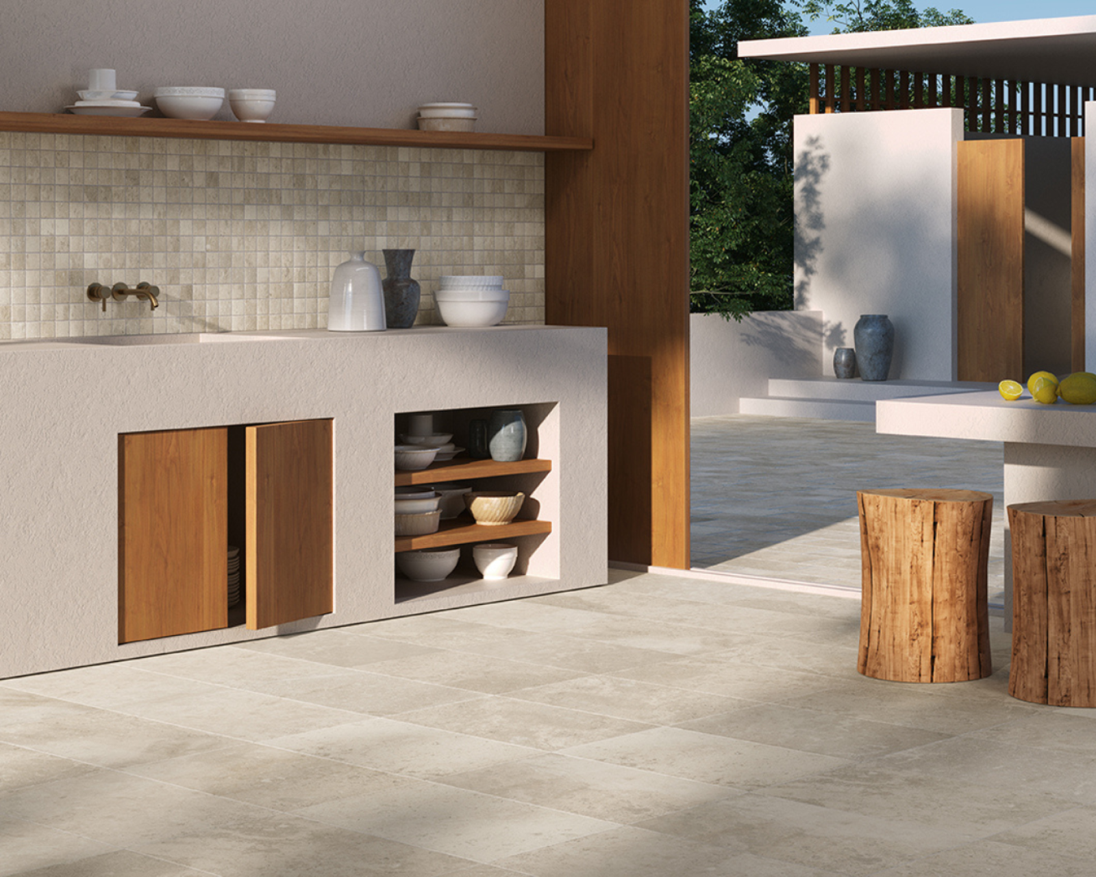 Cuisine extérieure en carrelage effet pierre naturelle couleur beige à Sanary près de Six Fours